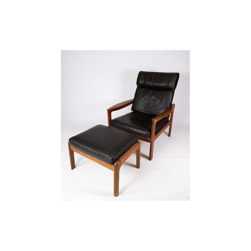 Poltrona vintage con sgabello in teak rivestito in pelle nera di Arne Vodder per Komfort, 1960