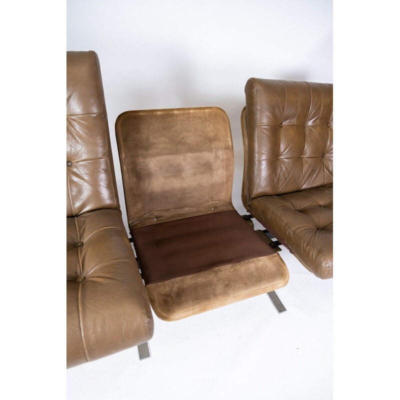 Vintage Three seater sofa upholstered with light brown leather and metal frame, Danish 1970s