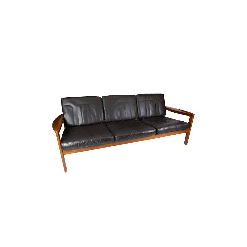 Vintage teak three seater sofa and upholstered with black leather by Arne Vodder 1960s