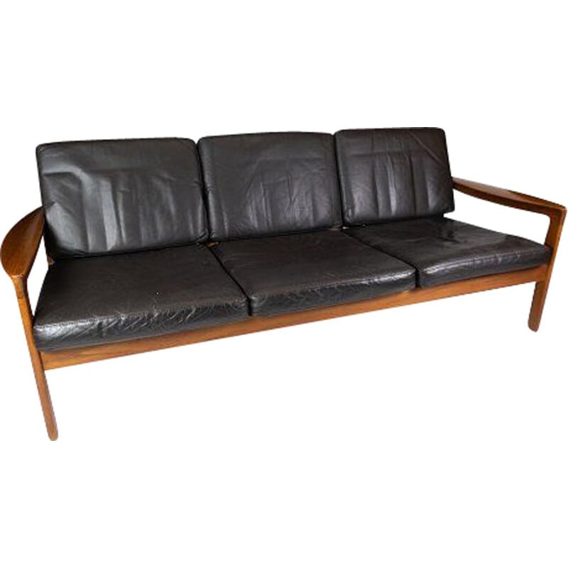 Vintage teak three seater sofa and upholstered with black leather by Arne Vodder 1960s