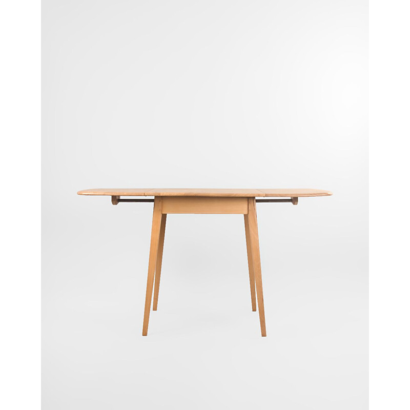 Vintage extendable table in elm and beech by Lucian Ercolani for Ercol, England1960