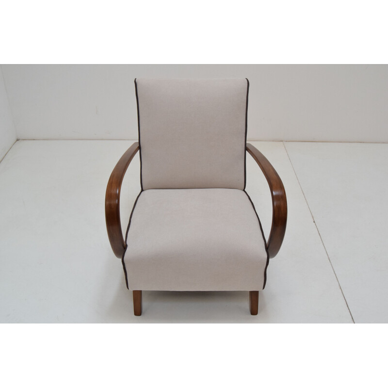 Vintage fauteuil en kruk van Jindrich Halabala, 1950