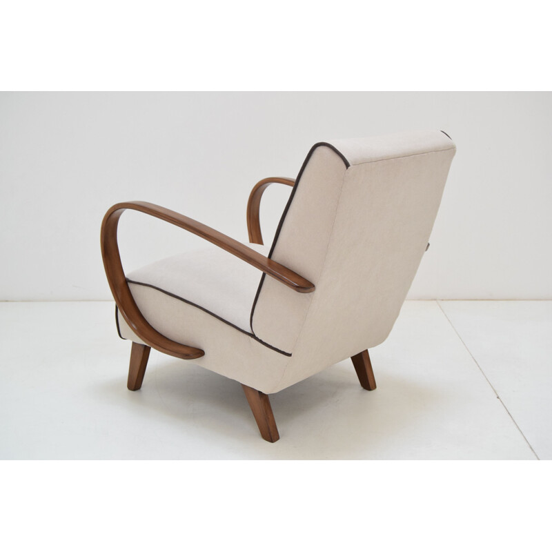 Vintage fauteuil en kruk van Jindrich Halabala, 1950