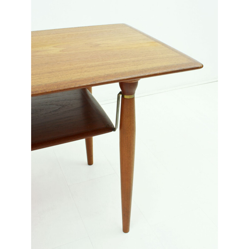 Scandinavian coffee table in teak with brass details - 1960s