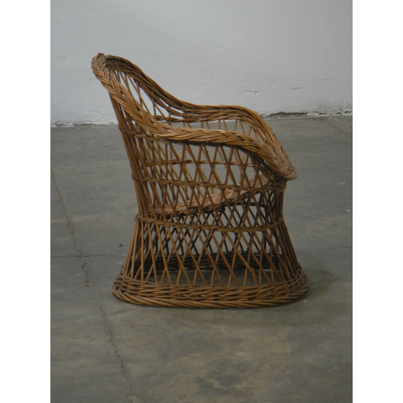Pequeño sillón de ratán vintage