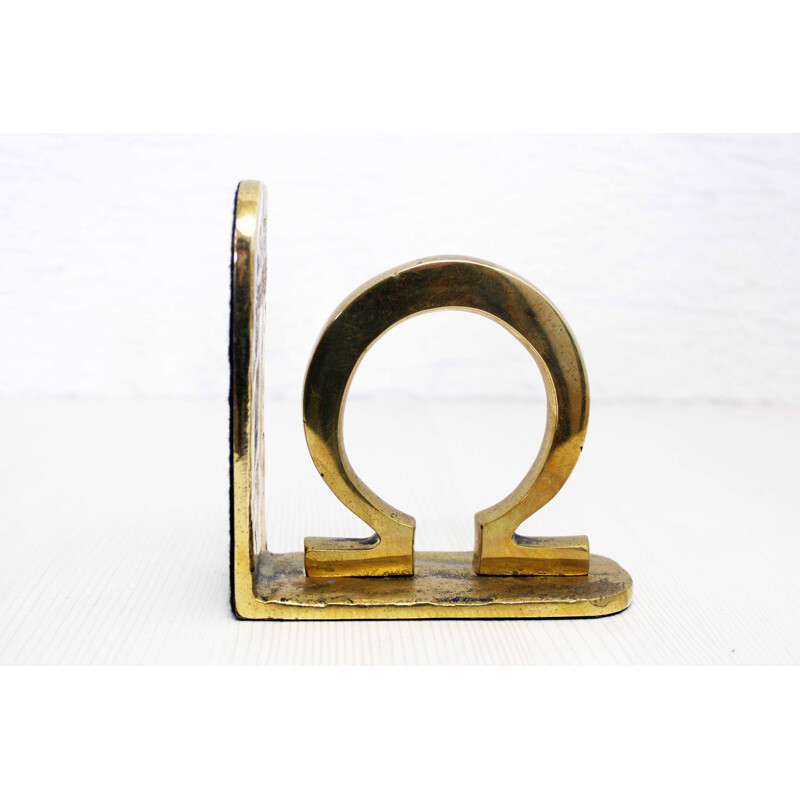 Vintage Alpha Omega bookend in brass