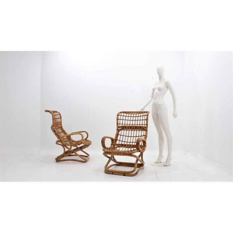 Vintage rattan lounge chairs by Tito Agnoli 1960s