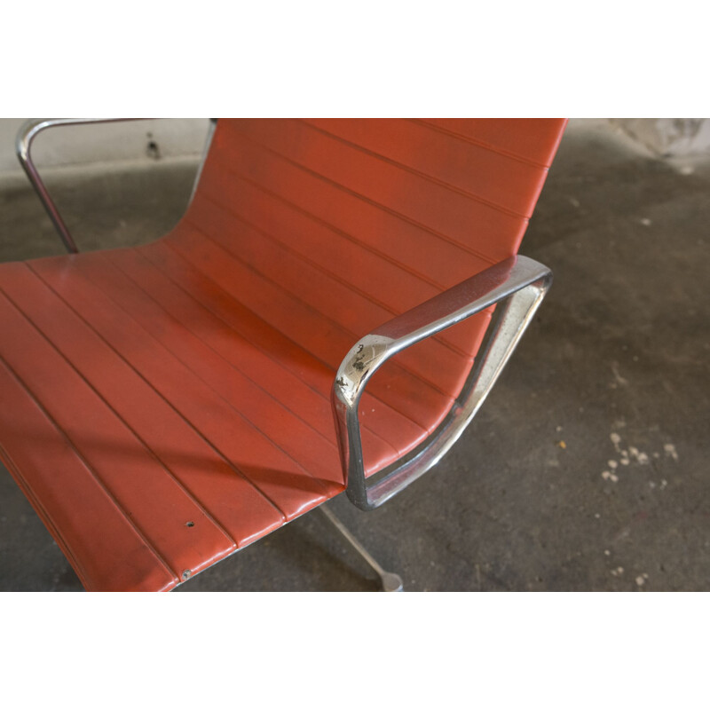 Vintage armchair Eames EA 116 herman miller in orange leatherette