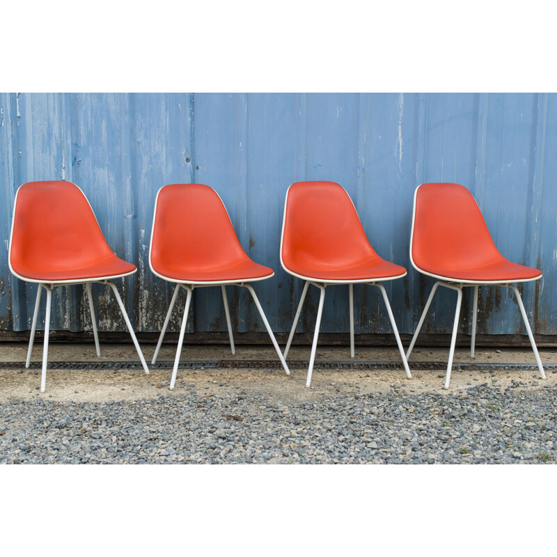 Suite de 4 Chaises vintage en skai orange et fibre parchemin