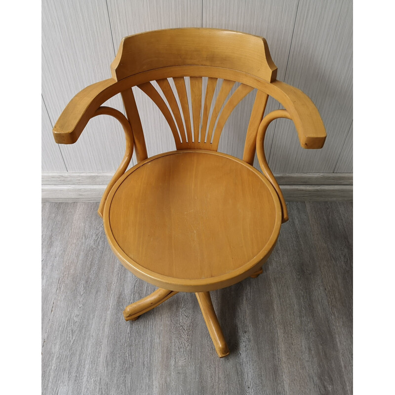 Vintage wooden swivel chair