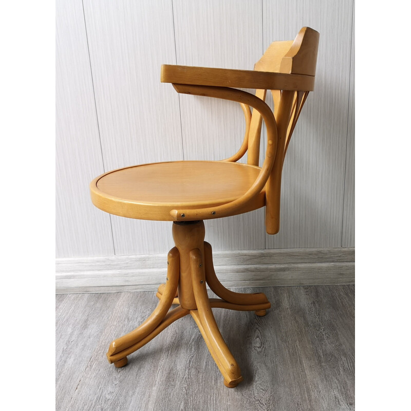 Vintage wooden swivel chair