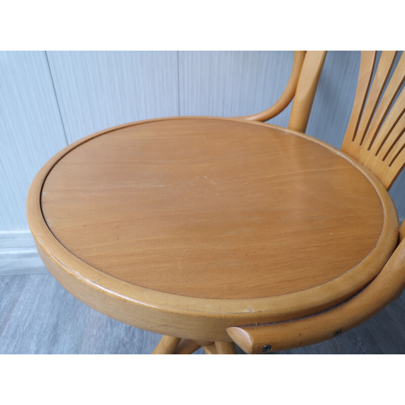 Vintage wooden swivel chair