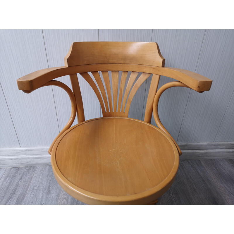 Vintage wooden swivel chair