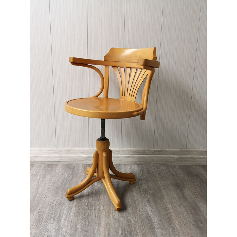 Vintage wooden swivel chair