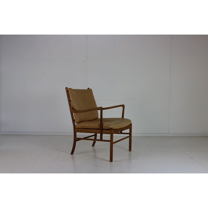 Vintage chair with beige leather cushion by Poul Jeppesen Denmark