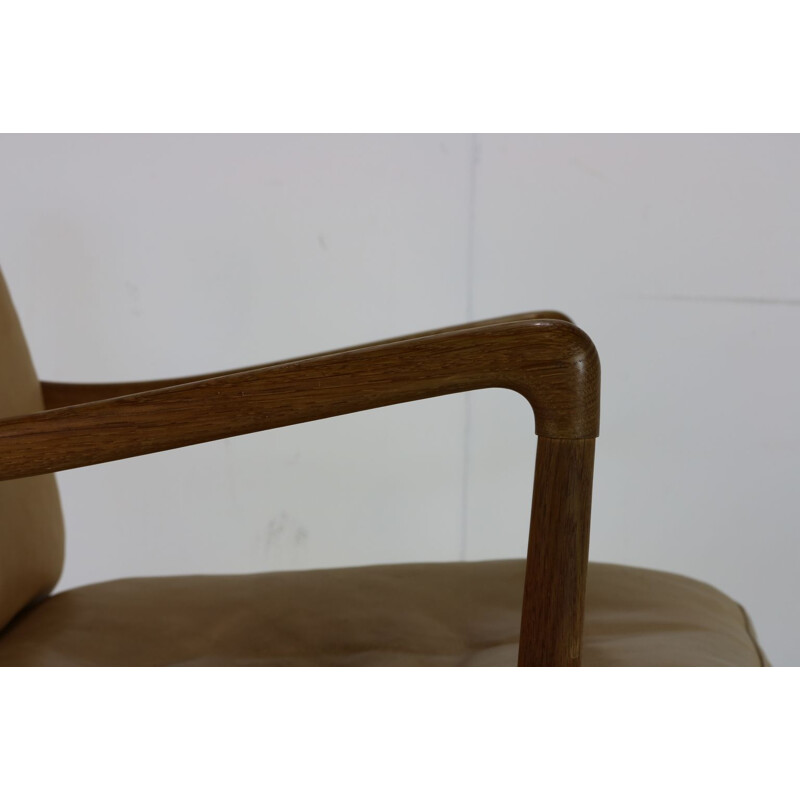 Vintage chair with beige leather cushion by Poul Jeppesen Denmark