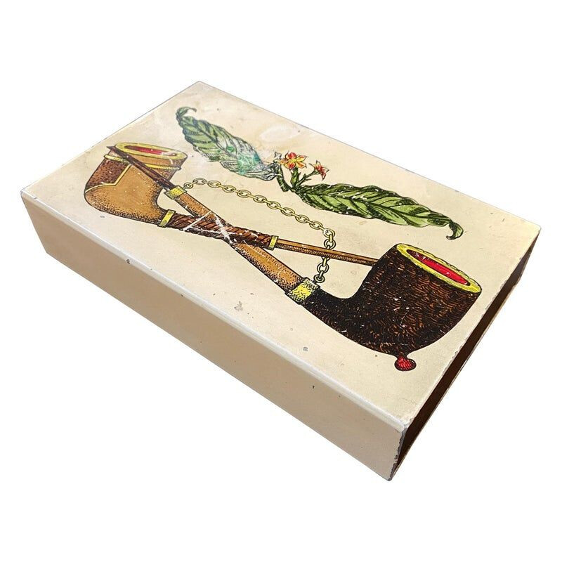 Boîte à cigarettes vintage décorée de pipes par l'Atelier Fornasetti