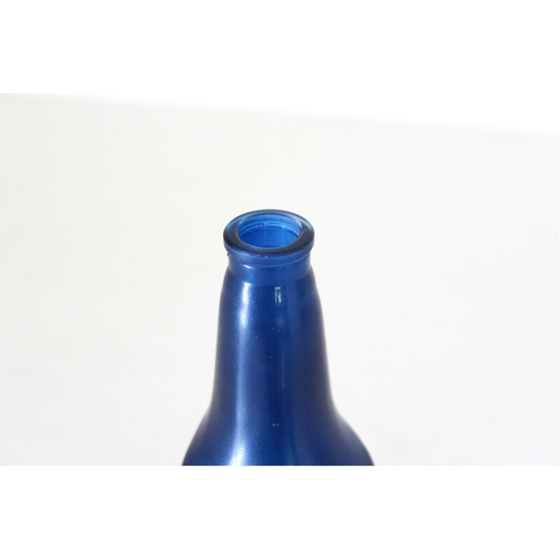 Vintage colored glass liquor bottle by Salvador Dali for Rosso Antico Ltd, 1970