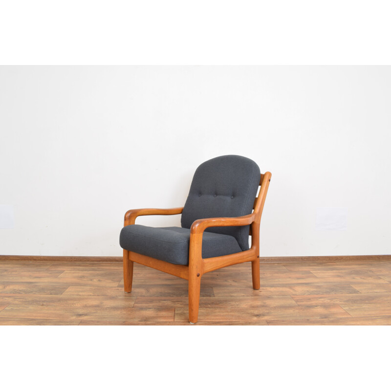 Fauteuil vintage en teck de Dyrlund Danemark 1970