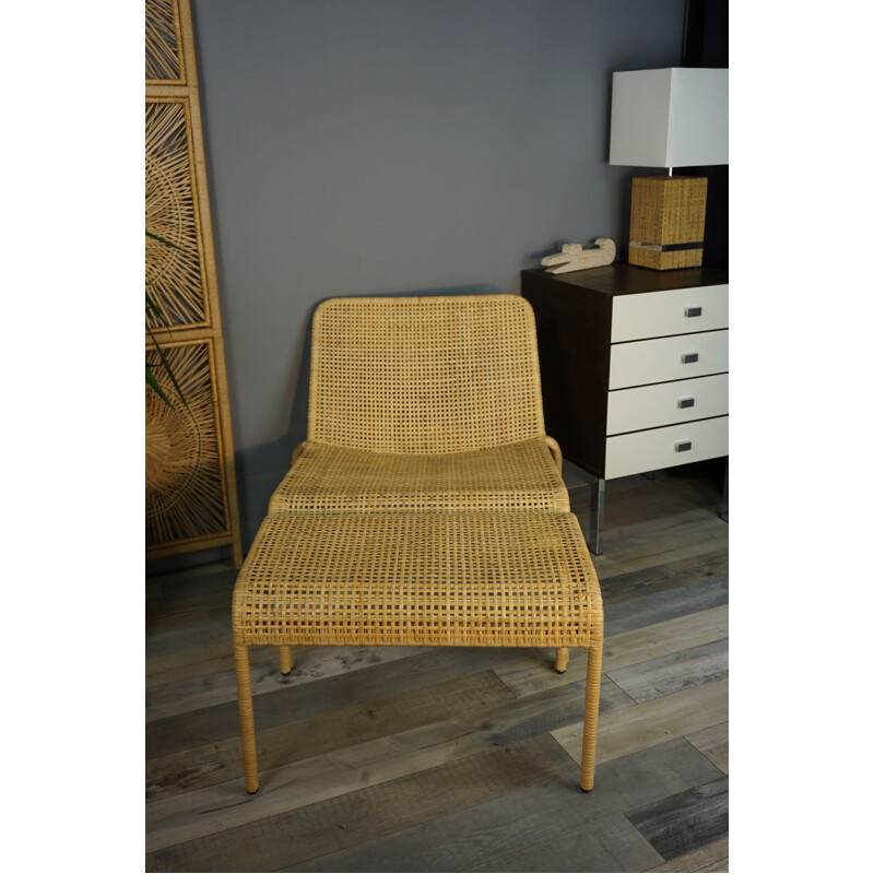 Vintage rattan lounge chair and its matching ottoman