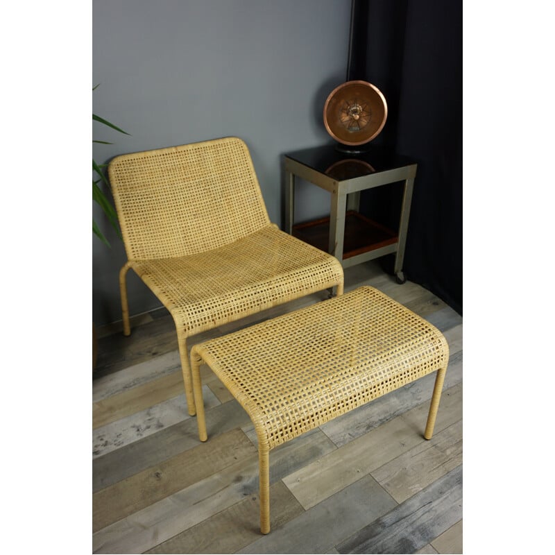 Vintage rattan lounge chair and its matching ottoman