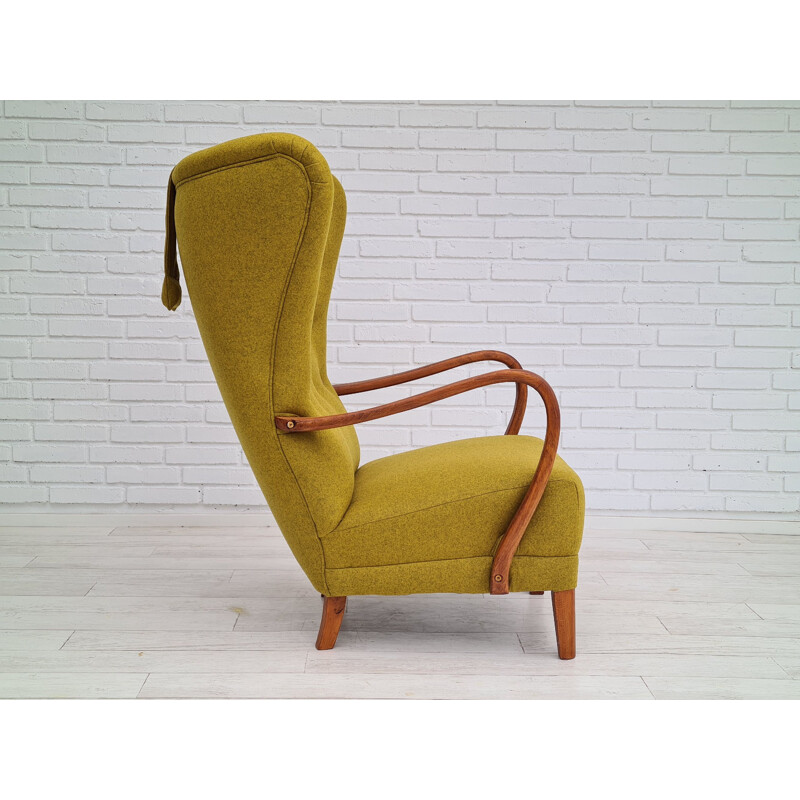 Vintage high back armchair in yellow felted woolen upholstery