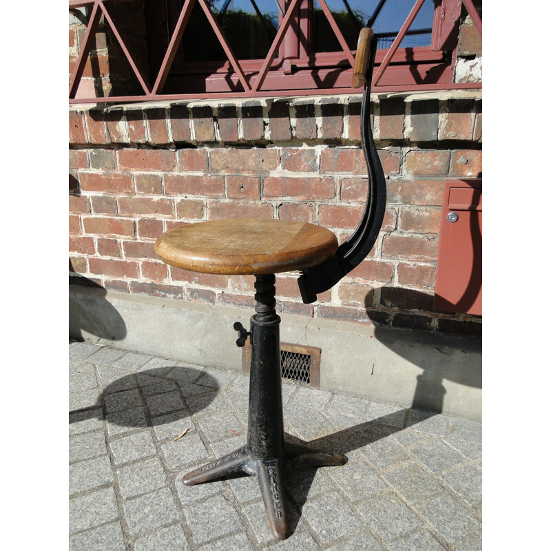 Industrial Singer chair in oakwood and black painted metal - 1930s