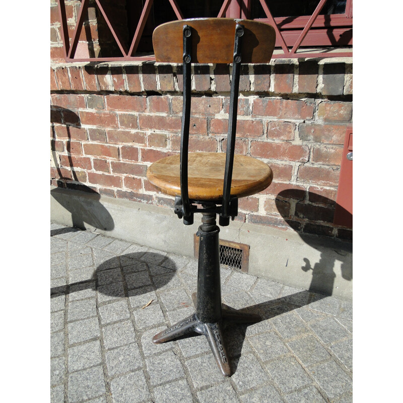 Industrial Singer chair in oakwood and black painted metal - 1930s