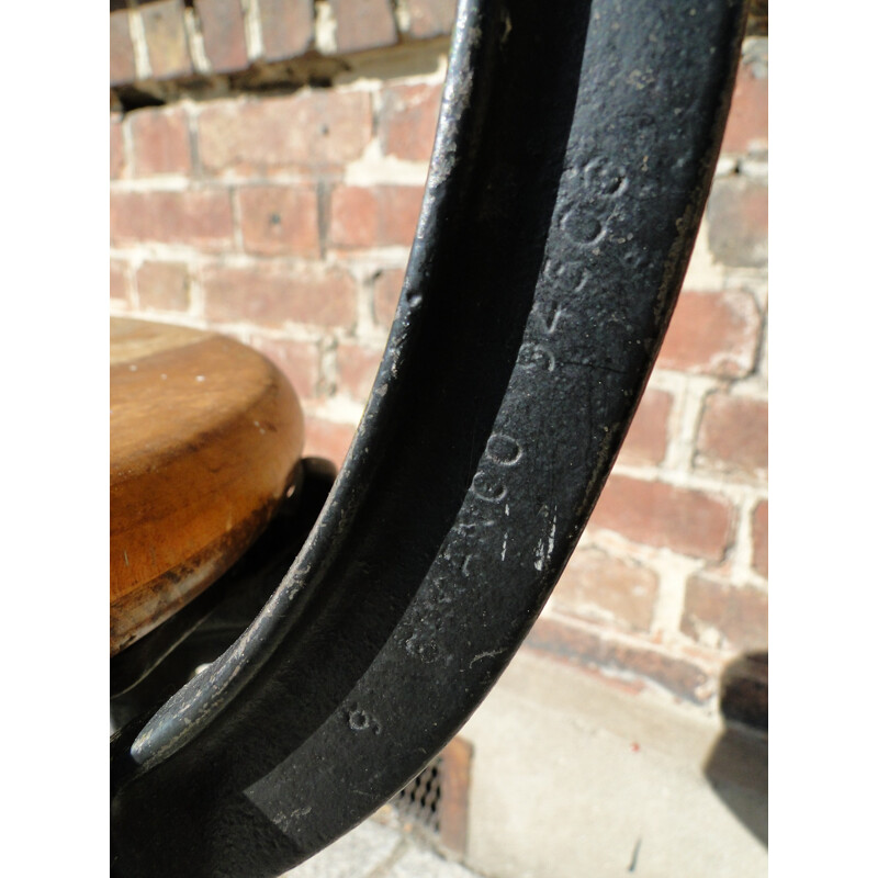 Industrial Singer chair in oakwood and black painted metal - 1930s