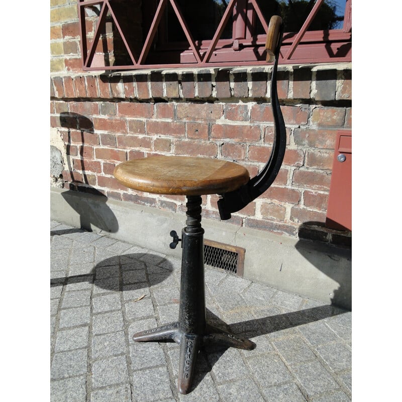 Industrial Singer chair in oakwood and black painted metal - 1930s