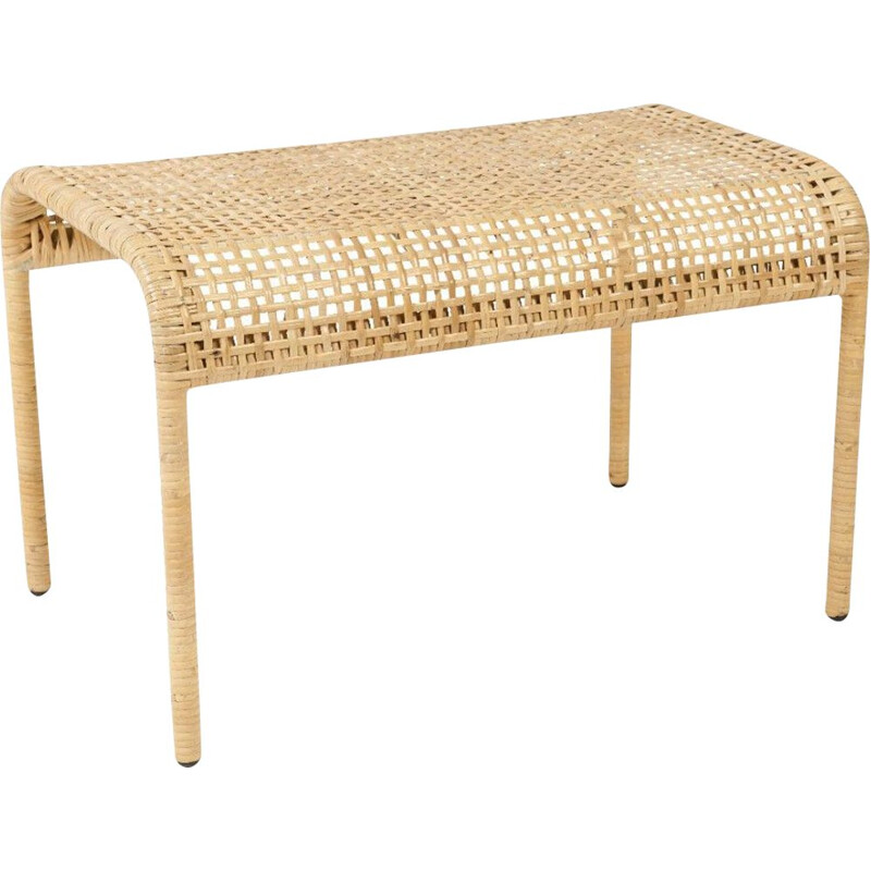 Vintage footrest in metal and woven rattan