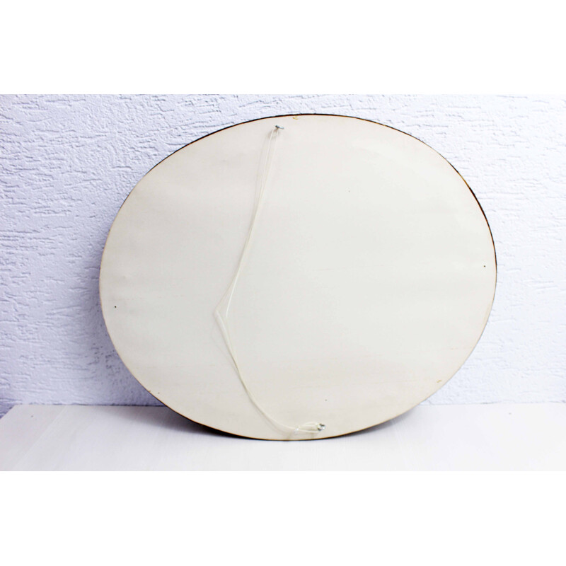 Vintage mirror gilded  with floral decoration in stucco