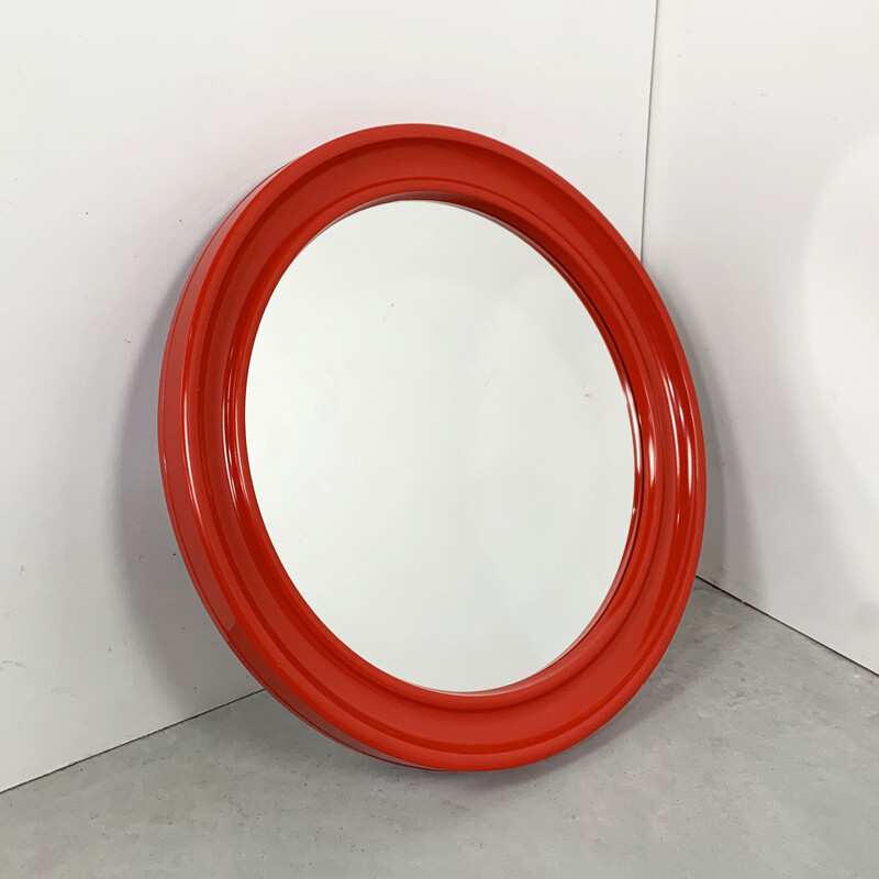 Vintage mirror in red round plastic Italy 1970s