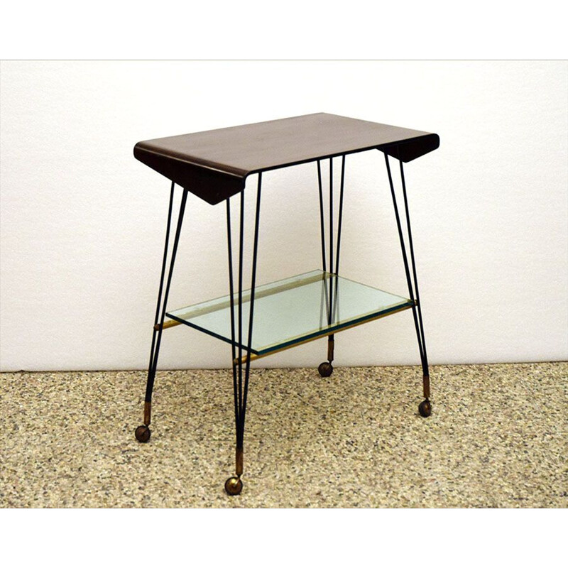 Vintage curved plywood side table with casters 1960