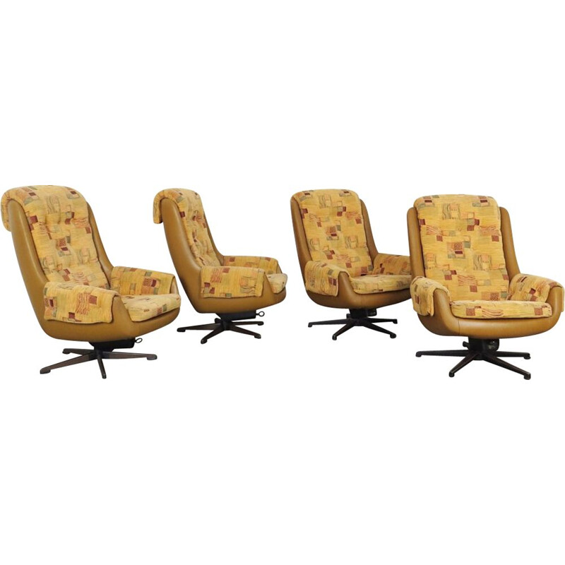 Set of 4 vintage swivel armchairs by Peem