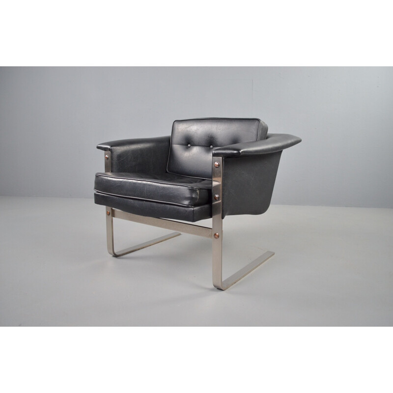 Fauteuil longue vintage en simili cuir noir par Beaufort 1950