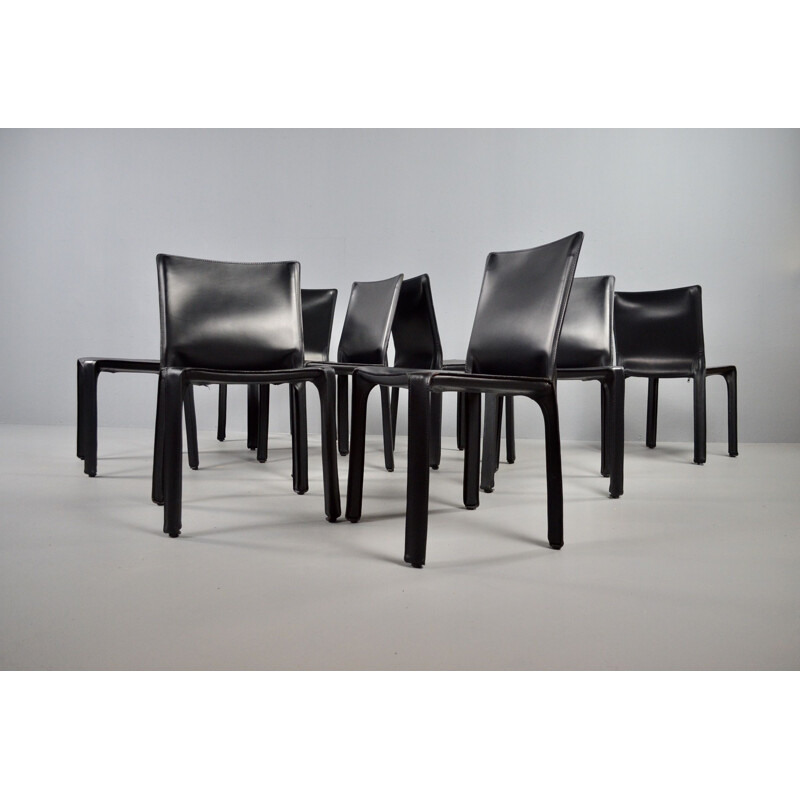 Set of 8 vintage black leather chairs by Mario Bellini 1977s