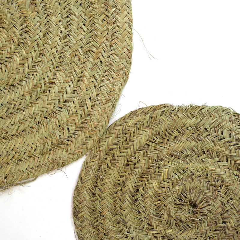 Round vintage carpet in natural fiber braided