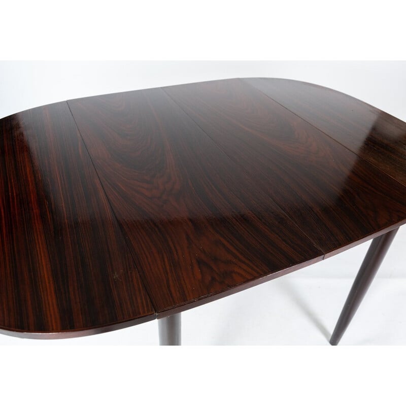 Table vintage en palissandre avec extensions  par Arne Vodder 1960