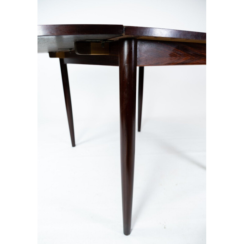 Table vintage en palissandre avec extensions  par Arne Vodder 1960