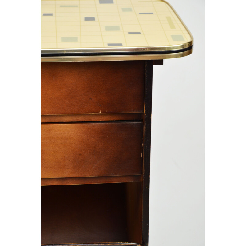 Vintage bedside table on casters 1960