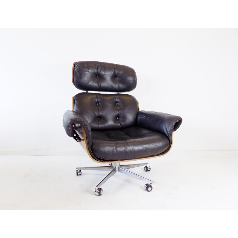 Vintage black leather armchair by Martin Stoll 1960