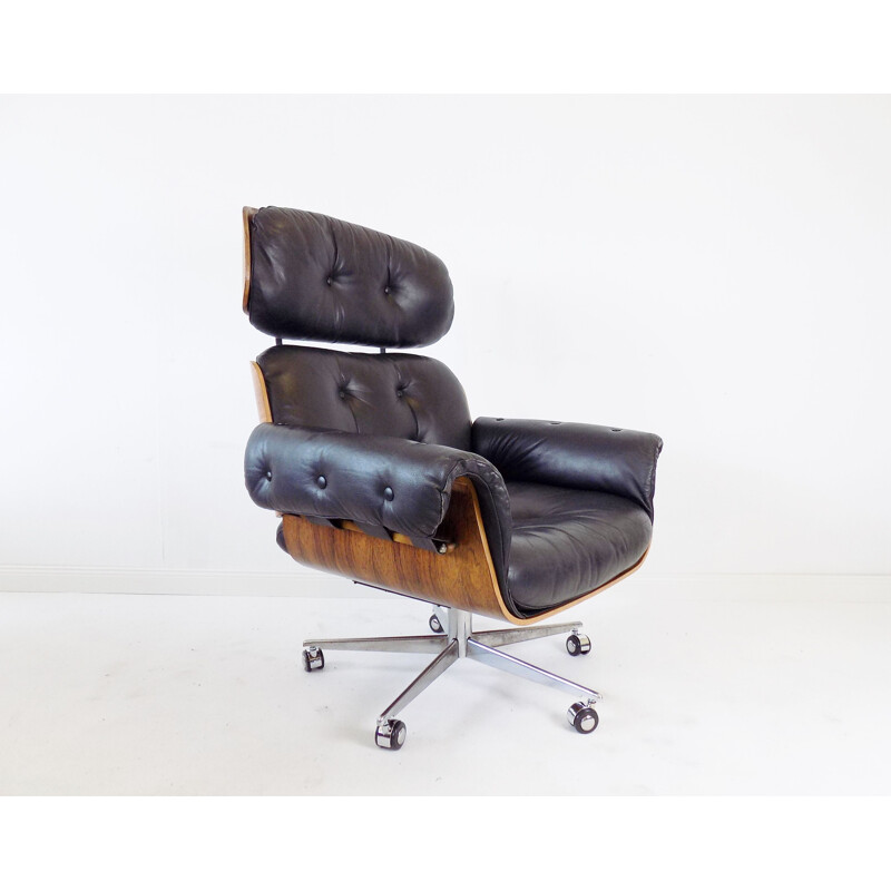 Vintage black leather armchair by Martin Stoll 1960