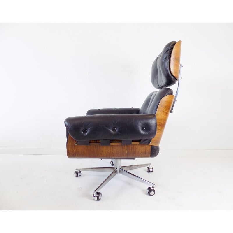 Vintage black leather armchair by Martin Stoll 1960