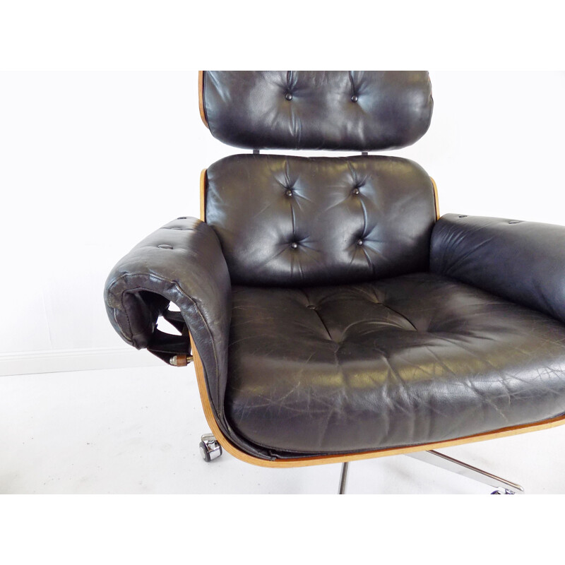 Vintage black leather armchair by Martin Stoll 1960