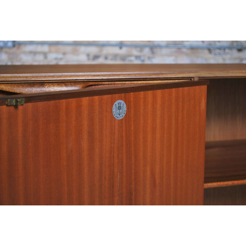 Vintage teak sideboard by Tom Robertson for McIntosh, Scotland, circa 1960s. 