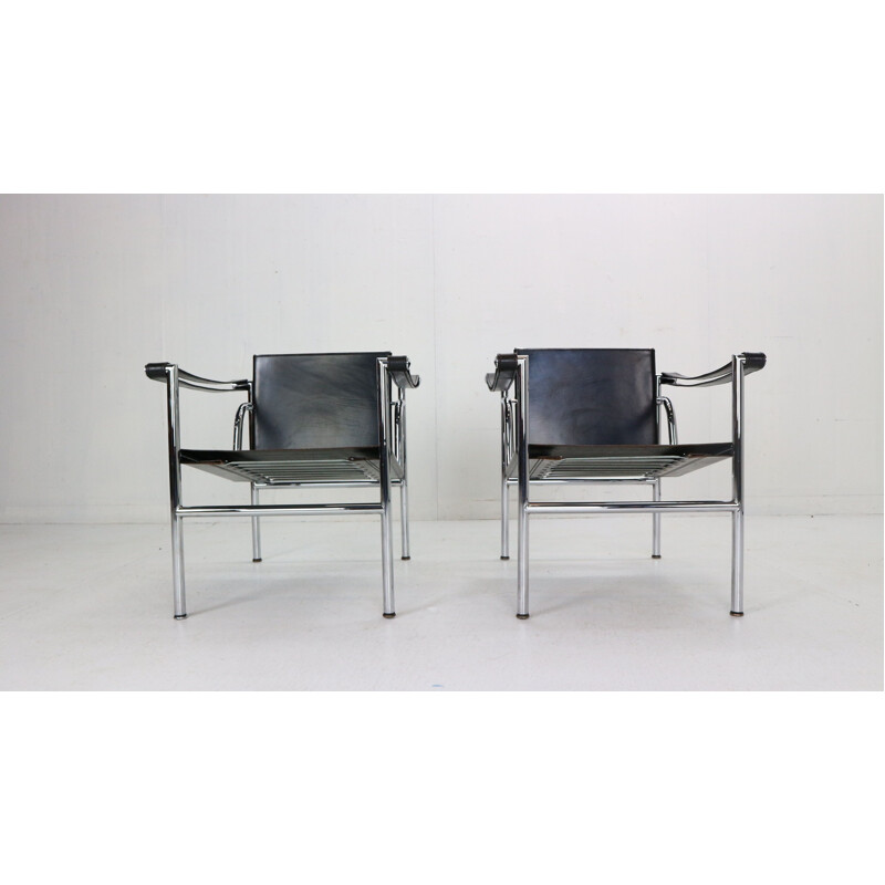 Pair of vintage LC1 black leather armchairs, Le Corbusier for Cassina 1970s