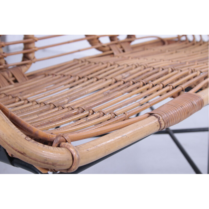 Vintage rattan sofa with lime green cushion 1960s