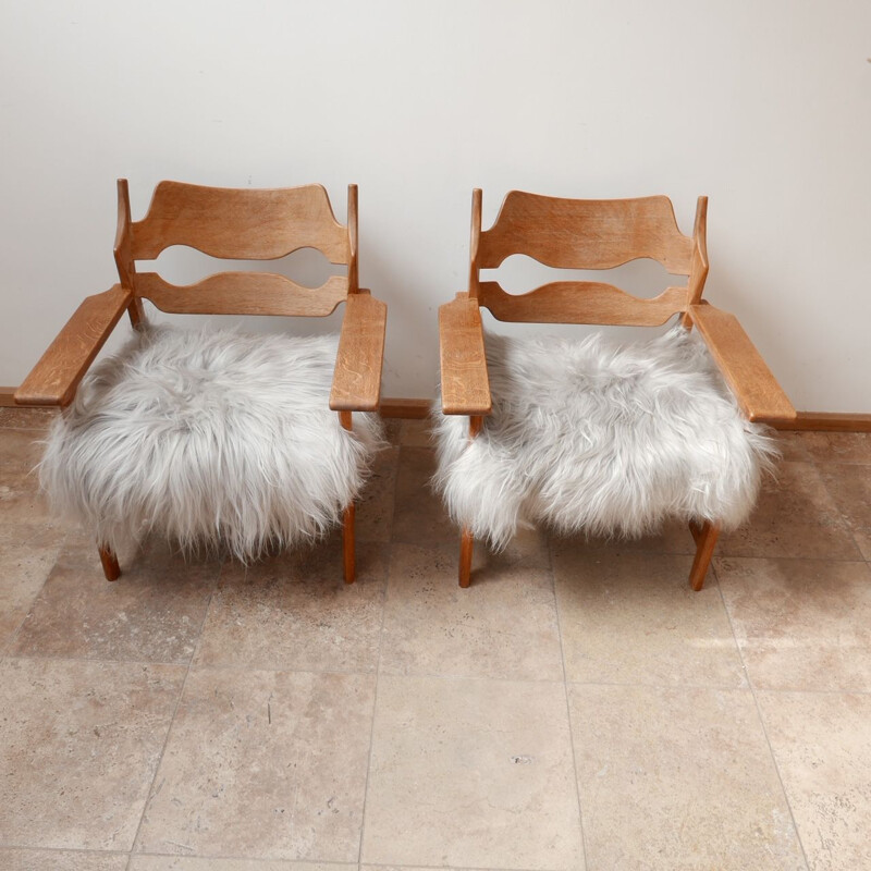 Pair of vintage oak sheepskin armchairs by Henning Kjaernul Denmark