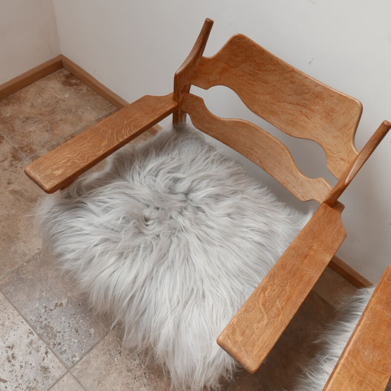 Paire de fauteuils vintage en peau de mouton en chêne de Henning Kjaernul Danemark